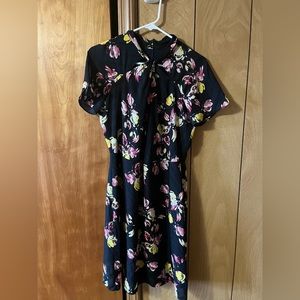 Your work wardrobe just got an upgrade with this adorable dress!